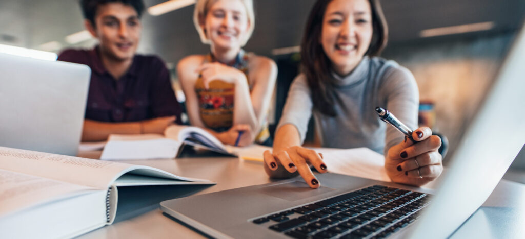 group of happy friends working on laptop in class 2022 02 02 05 05 34 utcw456y 1